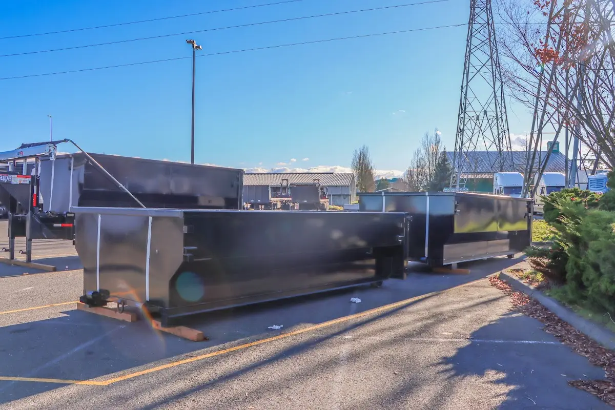 Roll-off dumpster ready for waste disposal at job site for 3 Yard Dumpster Rental in Wrentham